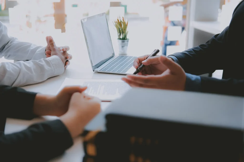An attorney consulting a case for two people.