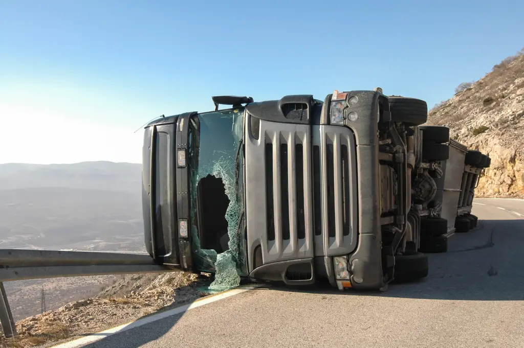 A truck rolled over on its side.