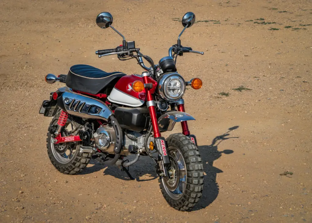 A red and white mini bike.
