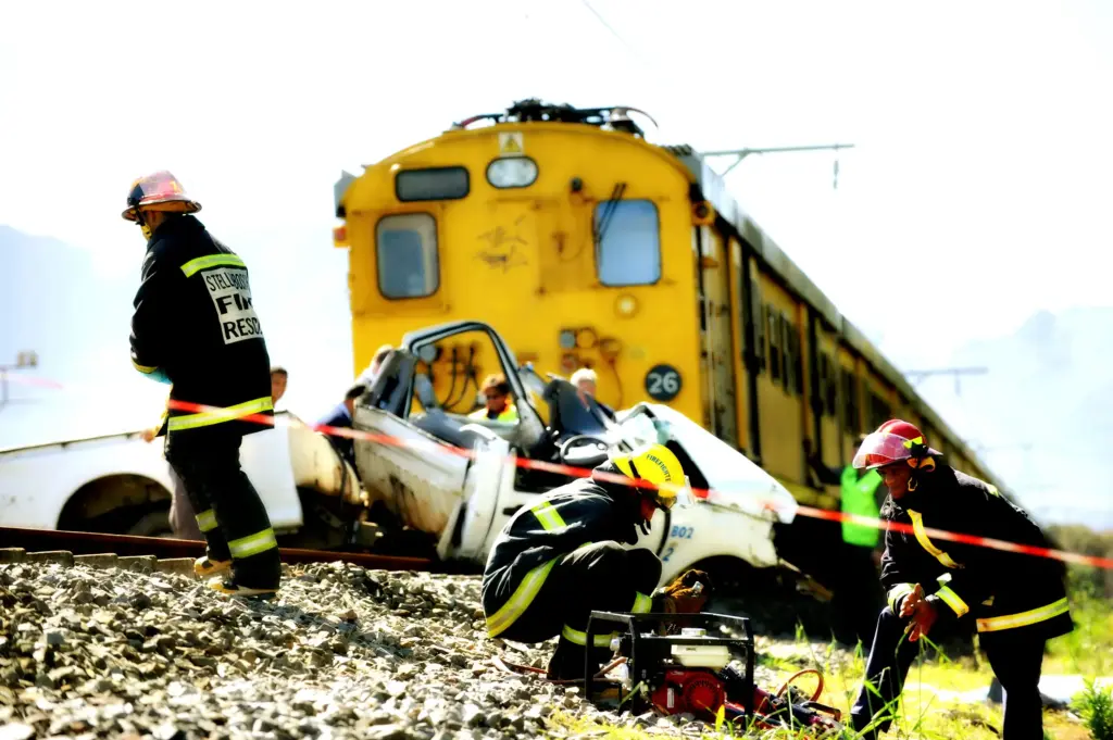 A train accident involving a car. 